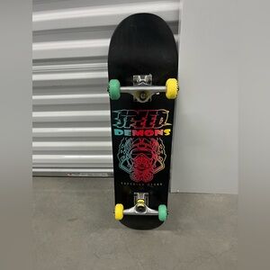 Black Skateboard with Colorful Graphics
